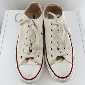 Cream colored, low top converse